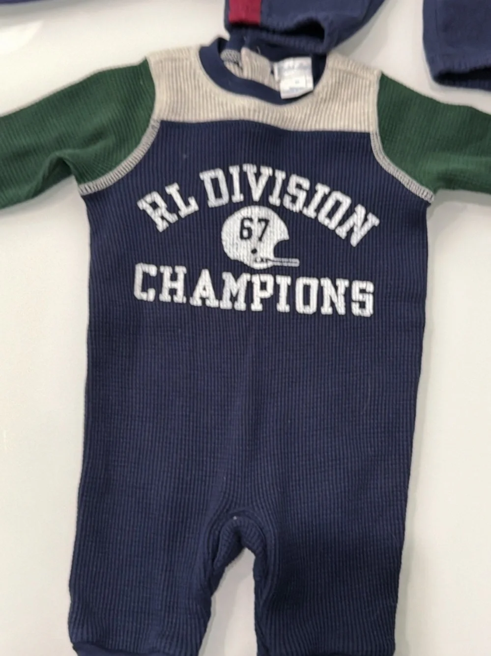 Ralph Lauren navy one-piece with green sleeves and cream yoke